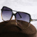 Солнцезащитные очки Tom Ford TF5578-B